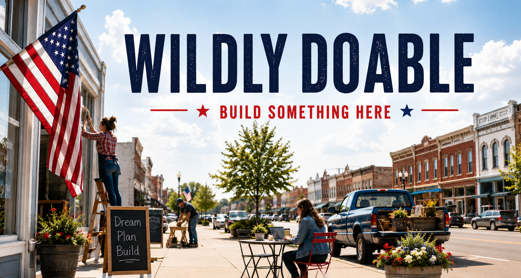 Small-town Main Street: a woman on a ladder painting a storefront window beside an American flag, a pickup at the curb, and a woman working on a laptop at a cafe table